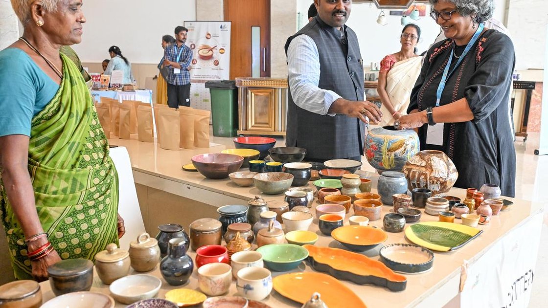 VMRDA Commissioner N. Tej Bharath visiting a handcrafted ceramic stall by Arra Pottery at the Women Entrepreneurs Expo in Visakhapatnam