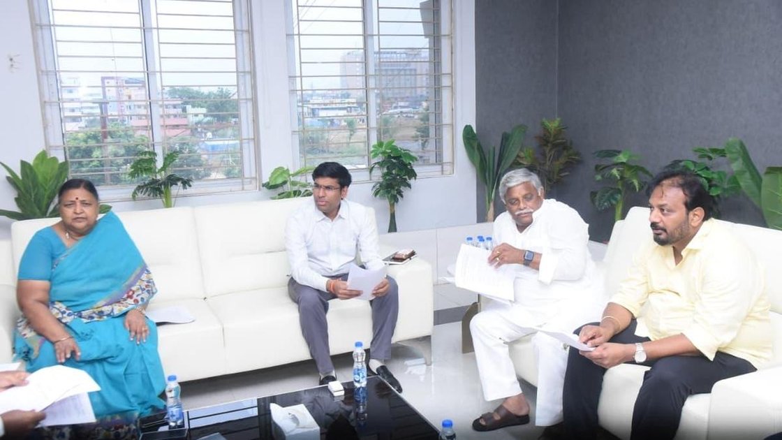 TTD board member Panabaka Lakshmi, District Collector S. Venkateswar, Jaggampeta MLA Jyothula Nehru and TUDA Chairman C. Divakar Reddy discussing land allocation to TTD employees in Tirupati