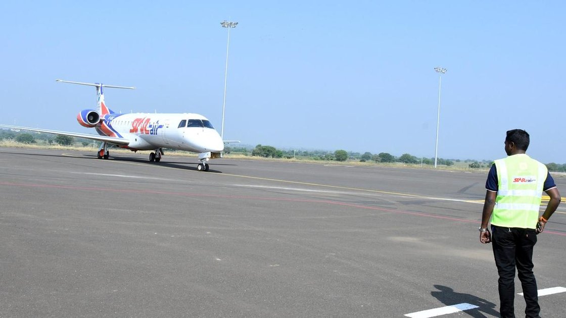 Star Air aircraft at airport with Mundra destination announcement