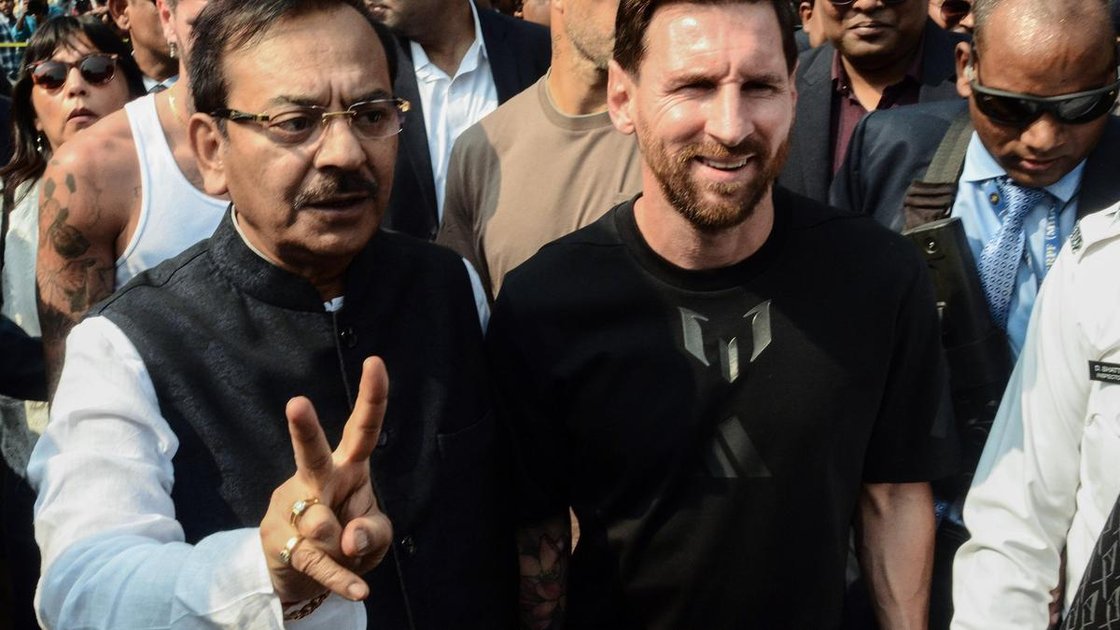 Lionel Messi with West Bengal Minister Aroop Biswas at Salt Lake Stadium during G.O.A.T India Tour 2025