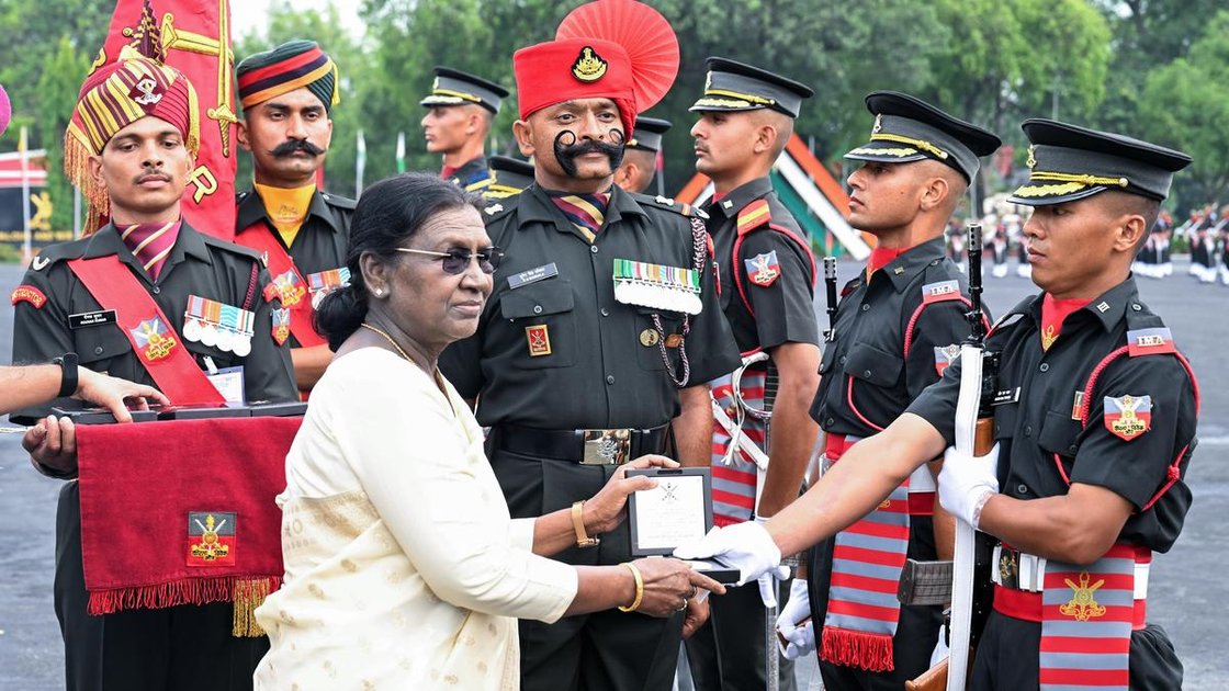 President Droupadi Murmu felicitates an Indian Military Academy cadet at the Passing Out Parade in Dehradun