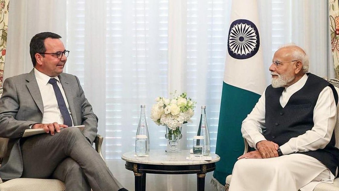 Prime Minister Narendra Modi meets CEO of Alstom, Martin Sion, in Paris on Thursday.