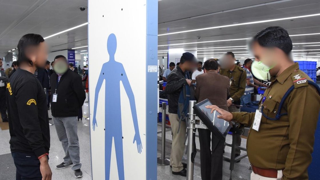 Full body scanner at an airport security checkpoint