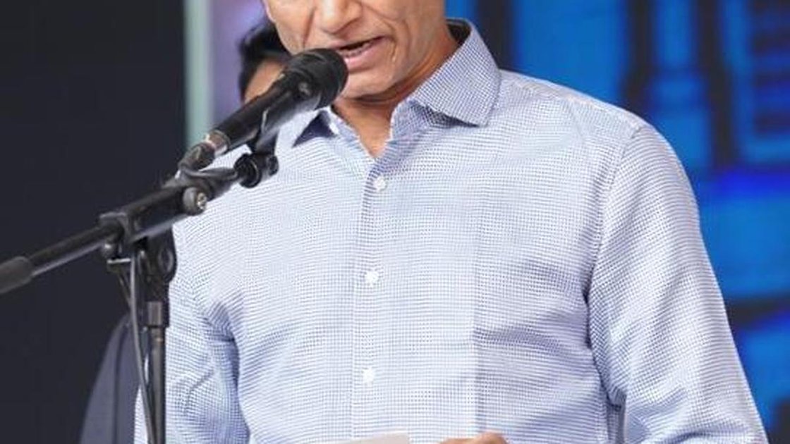 कर्नाटक के मंत्री कृष्णा बायरे गौड़ा एक प्रेस कॉन्फ्रेंस में बोलते हुए
