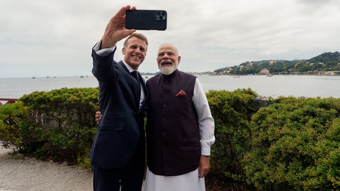 Prime Minister Narendra Modi and French President Emmanuel Macron shaking hands during bilateral meeting in Nice
