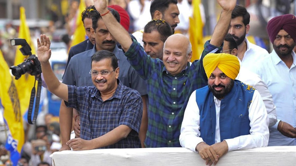 Arvind Kejriwal, Bhagwant Mann, and Manish Sisodia during a roadshow in Bathinda, Punjab