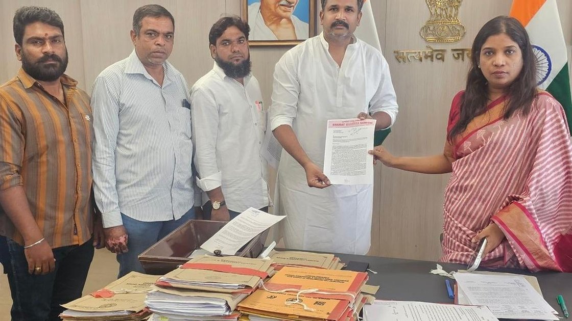 BRS leaders submitting representation to Hyderabad District Collector Priyanka Ala regarding government land dispute