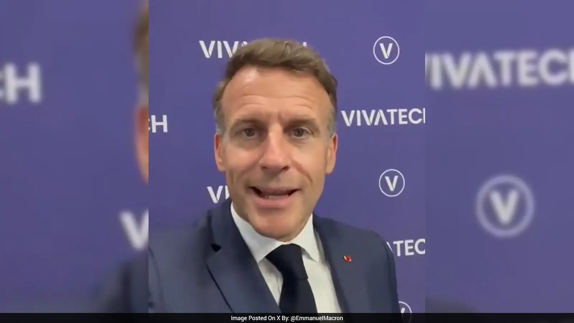 French President Emmanuel Macron and Prime Minister Narendra Modi shaking hands at the G7 Summit in France.