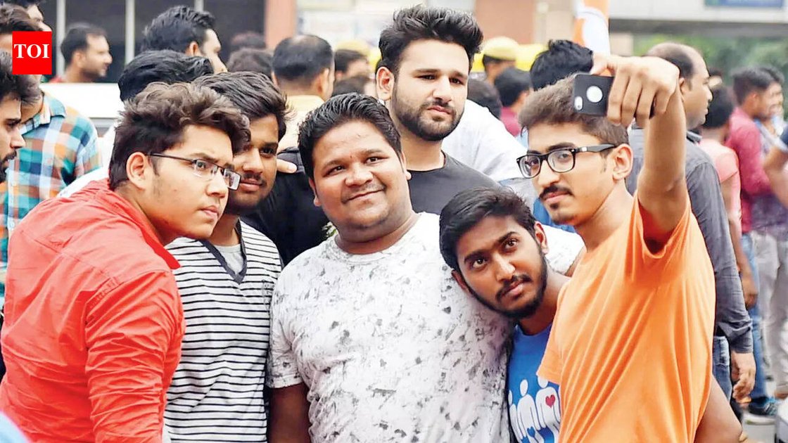 Students at an IIT campus discussing civil engineering project plans