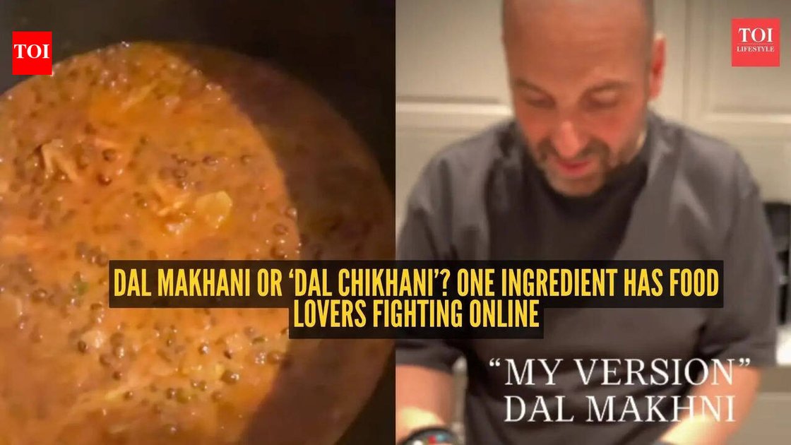 A bowl of dal makhani with a side of naan, representing the classic vegetarian dish at the center of the chicken stock controversy.
