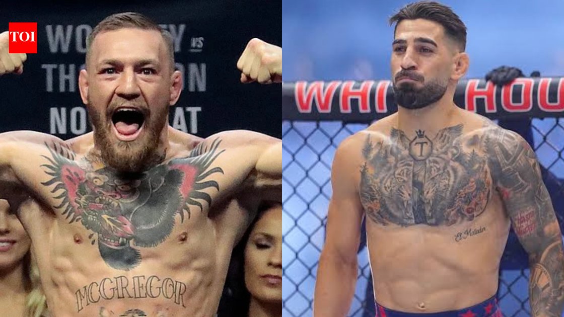 Conor McGregor और Ilia Topuria का UFC फाइट के दौरान एक्शन में फोटो